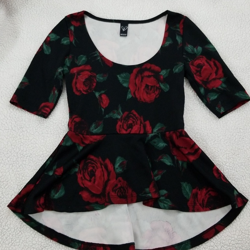 A dark floral peplum shirt